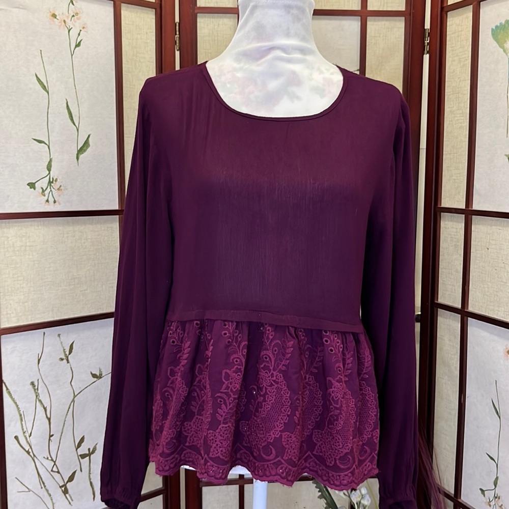 Beautiful purple peplum blouse 🌷